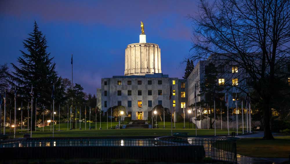Oregon state capitol building lit up at night